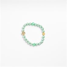 Green stretch bracelet with gold medal