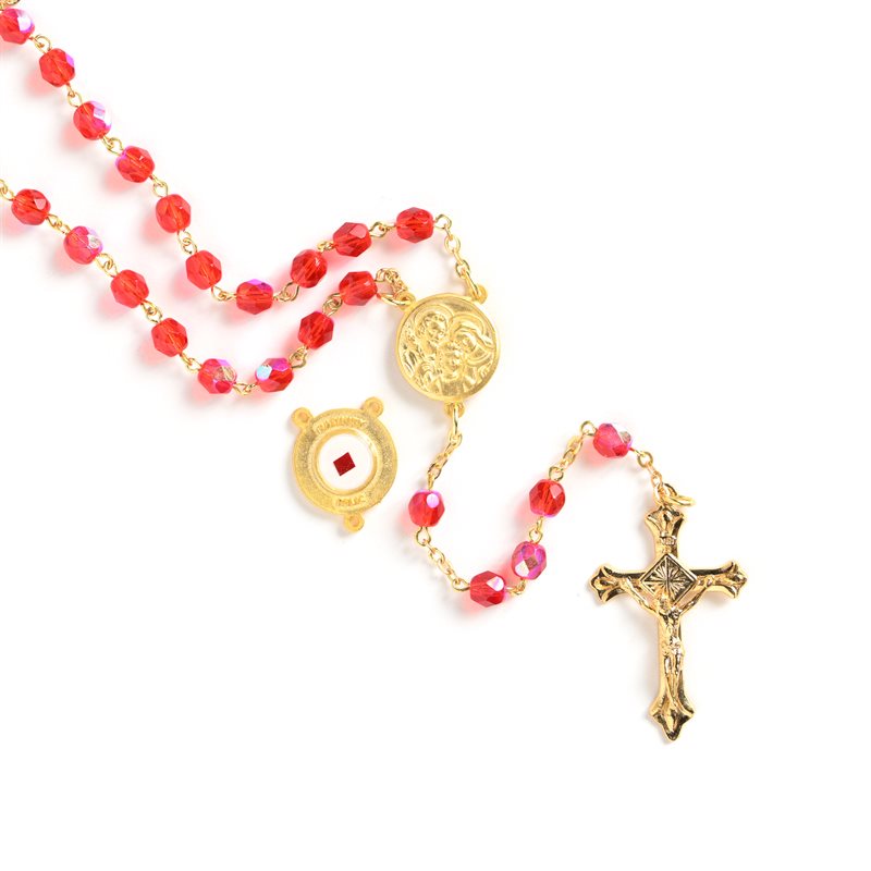 Red rosary with Nativity relic on gold